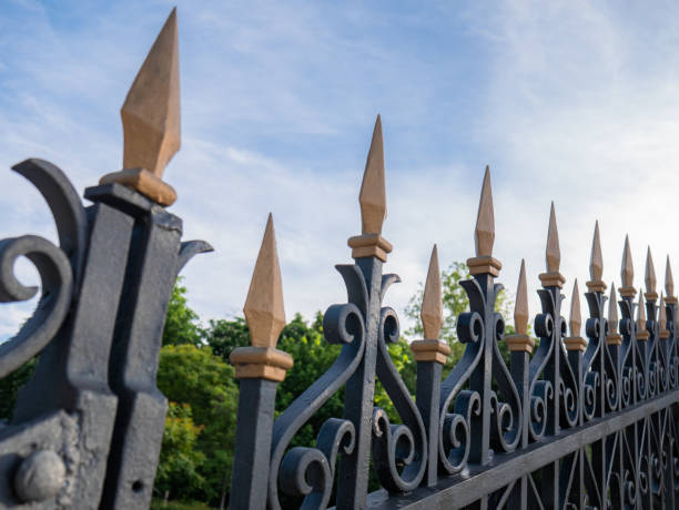 istock Metal fence with golden spear tips on top 1226260088