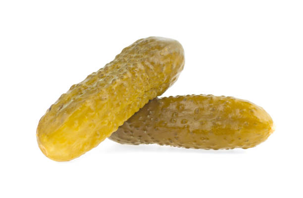 istock Fresh green pickles isolated over white background 1226260211