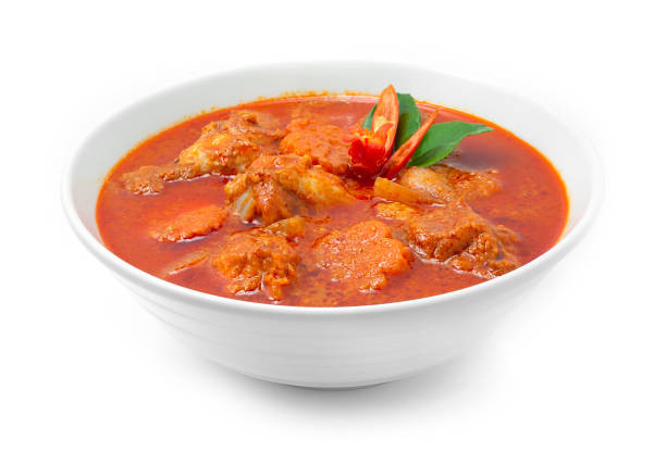 Chicken Curry Massaman Thai Food fusion Heritage traditional Style slow cooking braised with tomato stock photo