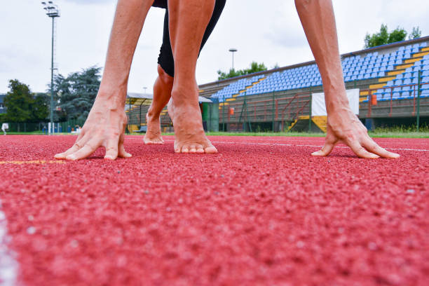 istock Closeup of barefoot athlete in starting position 1226263376