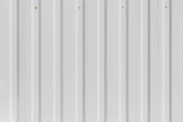istock White metal wall or fence background with vertical corrugated stripes 1226264904