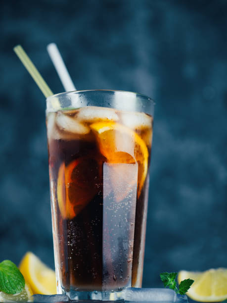 istock summer ice tea is a refreshing drink . iced tea, lemon and mint or alcoholic classic long island 1226265714