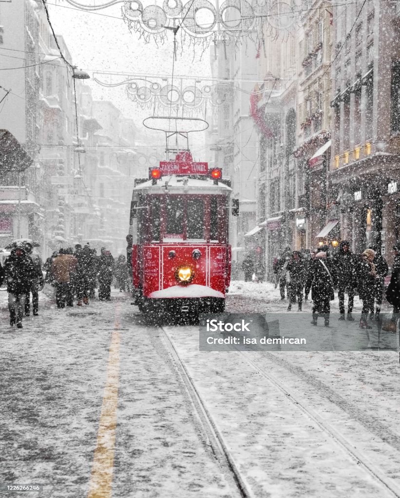 istanbul snowing and historical tramway istanbul snowing and historical tramway (snow and transportation) istanbul landmarks Istanbul Stock Photo