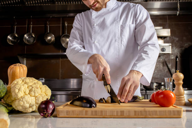 istock cropped chef cooking food in the kitchen 1226267193