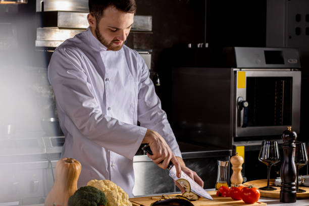 istock chef cooking food in the kitchen 1226267330