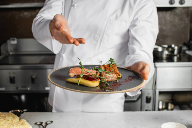 istock cook man show tasty dish cooked by him 1226267448