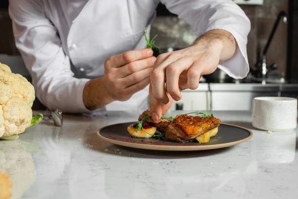 istock professional chef-cook decorate dish 1226267508