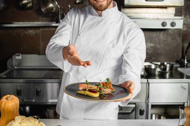 istock chef cooking food in the kitchen, in restaurant 1226268106