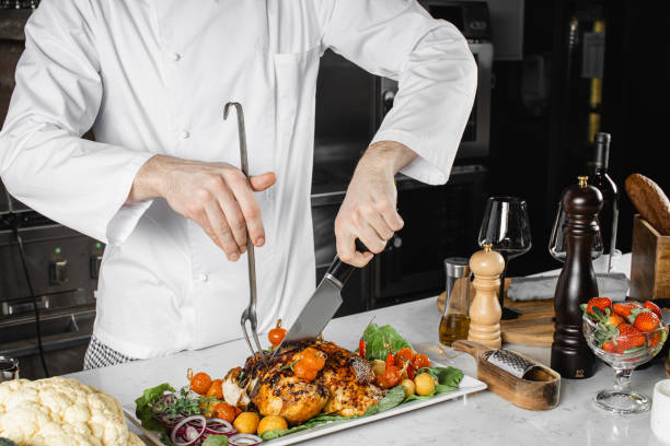 istock professional cook cut cooked meat for restaurant visitors 1226268120