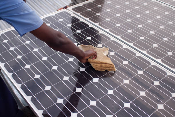 istock cleaning a solar plant 1226269806