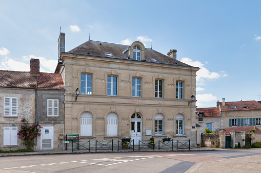 Town hall of Avilly-Saint-Léonard opposite the Church of Saint-Léonard in the city center.