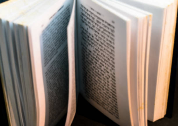istock Open Talmud Torah Tanakh Book on table. Selective focus. Blurred view 1226271607