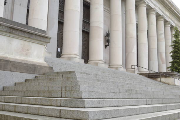 istock Sandstone Steps And Columns Of Neoclassical Building On Rainy Morning 1226273828