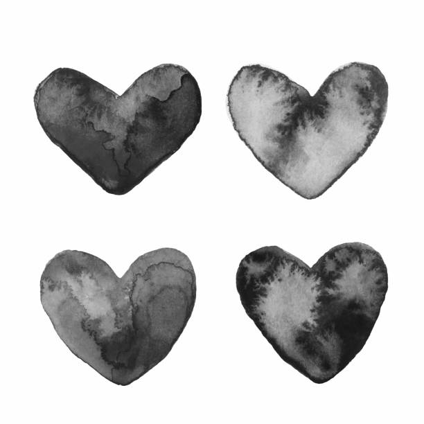 istock Set of four hearts painted in black watercolor with stains 1226274073