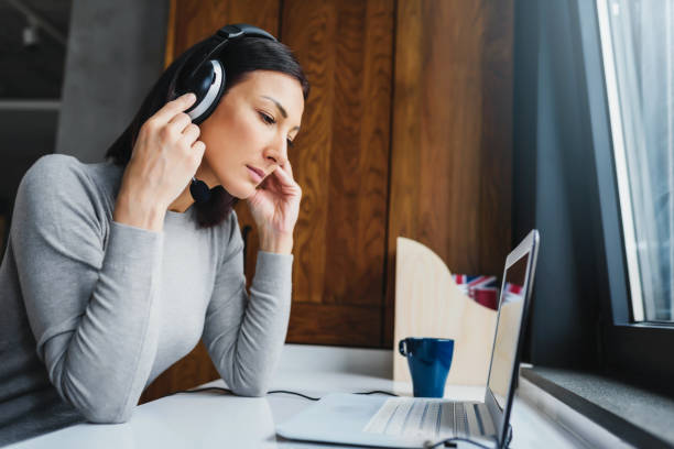 istock Young Woman Working from Home as an Online Support 1226275728