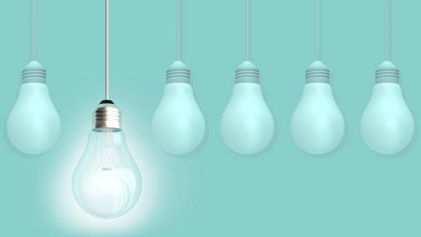 istock Turn on light bulb grow and bright only one in main focus point and  5 bulb turn off pastel color tone with 3d rendering. 1226276556