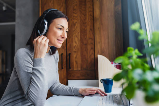 istock Young Woman Working from Home as an Online Support 1226276660
