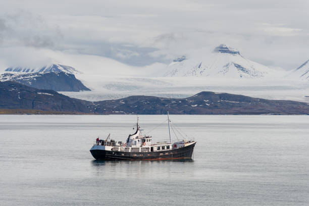 istock Small sailing vessel with beautiful lighting in Svalbard 1226276971