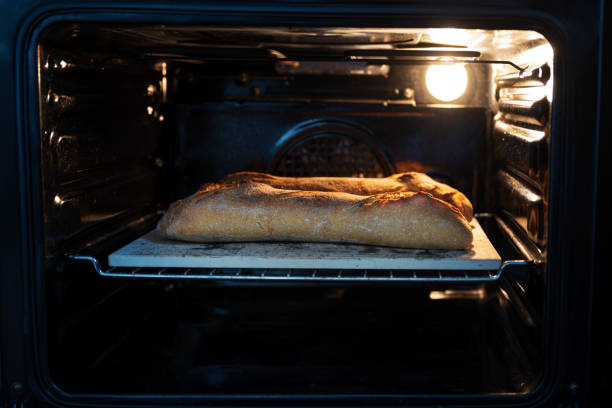 istock Sourdough bread baking in the oven 1226279636