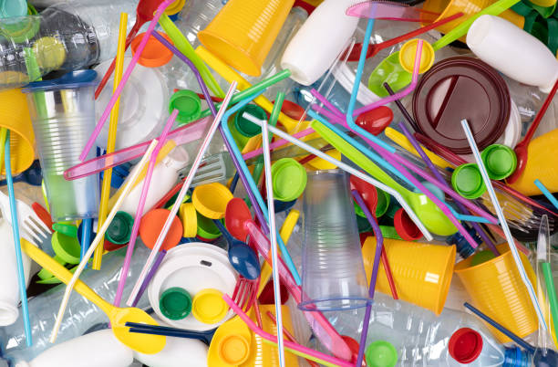 istock Disposable single use plastic objects such as bottles, cups, forks, spoons and drinking straws 1226281055