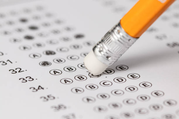 istock written mistake on a piece of paper, delete, correct, and mistake concept. Take the exam, write the exam 1226282379