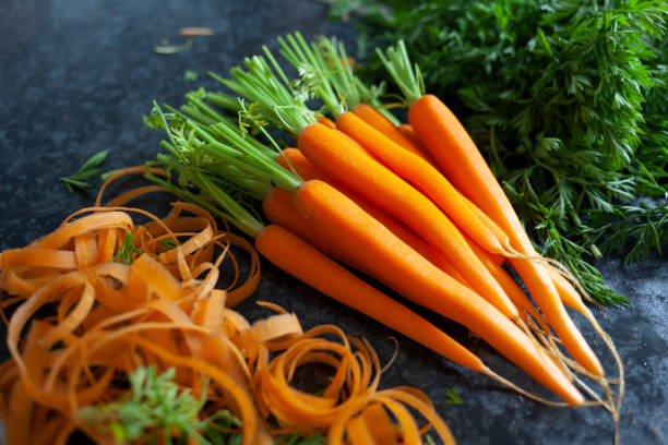 istock Bunch of fresh, peeled organic carrots 1226283373