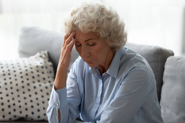 istock Sick senior woman touch head suffering from dizziness at home 1226286148