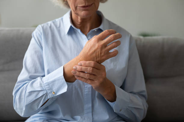 istock Sick senior woman check heart pulse on wrist 1226286153