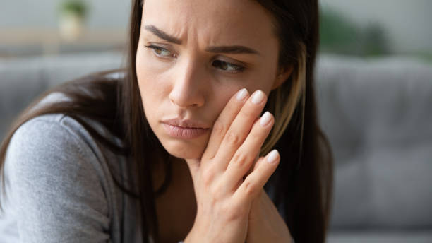 istock Sad young woman lost in thoughts feeling frustrated 1226286164