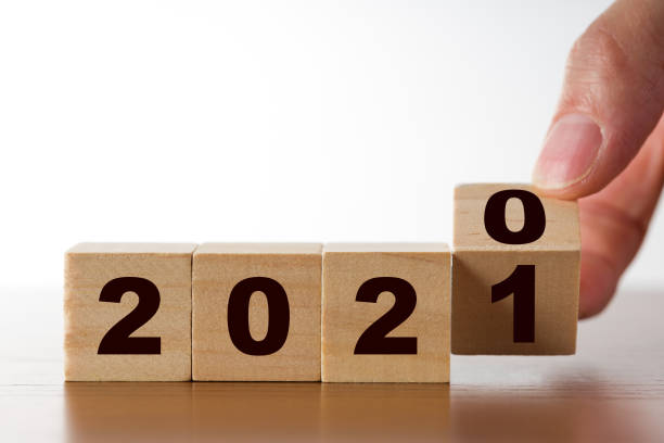 istock 2021 figure on wooden cubes 1226287281