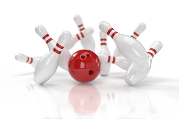 istock Bowling strike concept: red ball with pins (shallow dof) 1226290918