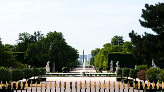 Tuileries Garden (Jardin des Tuileries) is empty, without tourists. The entrance portal is closed, few days after Covid19 lockdown in France, because parks stays closed in \