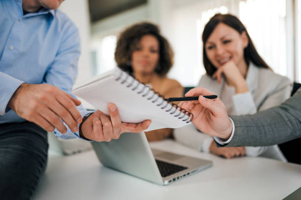istock Business people brainstorming, close-up, copy space 1226295244