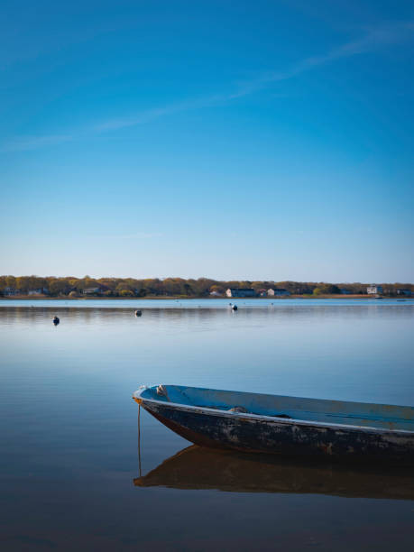 istock Cape Cod Seascape with Partial View of an Empty Boat at Sunrise 1226296282