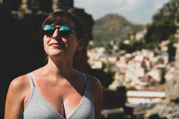 istock Beautiful model with sunglasses during summer time in Italy 1226301454