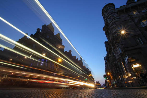 istock Light trails with Buildings in background during sunset 1226301660