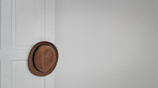 istock The Hat with on the white door white background 1226301697