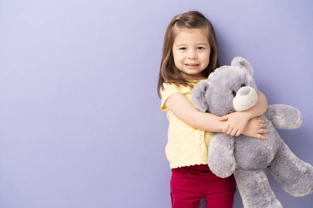istock Beautiful girl with a teddy bear 1226304106