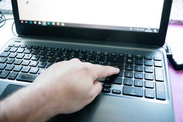 istock Pressing the enter key on a laptop 1226306309