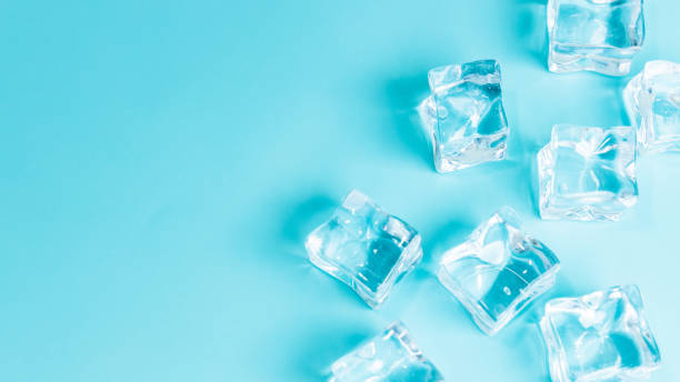 istock Ice cubes on blue background, Cubes of ice on a light blue background, Flat lay, top view, with copy space and field for text. 1226306845