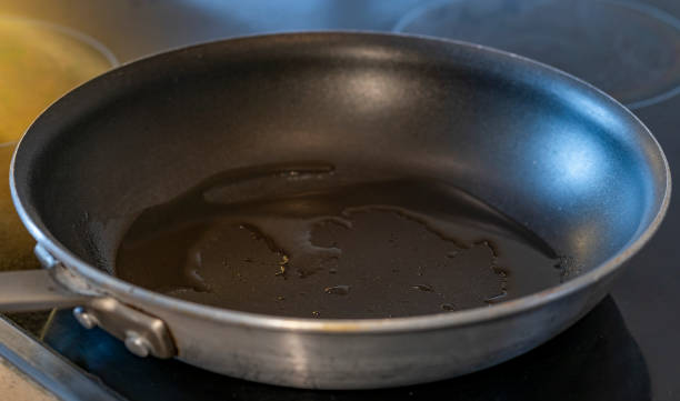 istock Cooking pan with oil in modern stove 1226308616