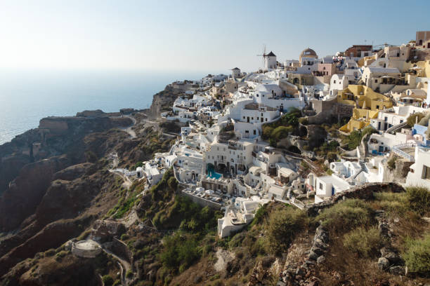 istock View on Greek village with wind mill, Oia, Santorini, Greece 1226312863