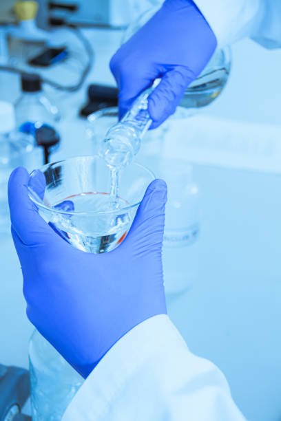 istock Scientist hand holding a Test tube, Laboratory research. 1226315249