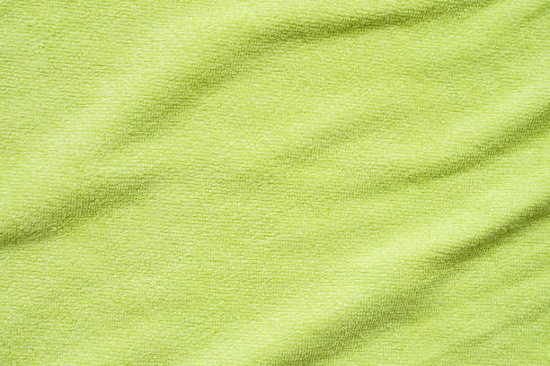 istock Green towel fabric texture surface close up background 1226317919