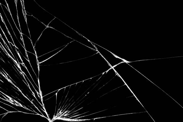 istock Black cracked Touch Screen Phone. Cracks and scratches on the surface. Abstract broken glass background or texture 1226321191