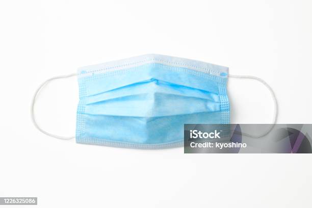 Isolated Shot Of Protective Face Mask On White Background Stock Photo - Download Image Now