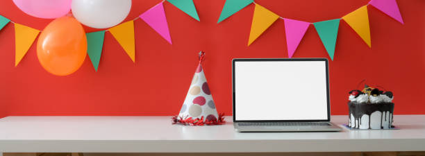 istock Online Birthday celebration concept with blank screen laptop, party hat and copy space 1226325785