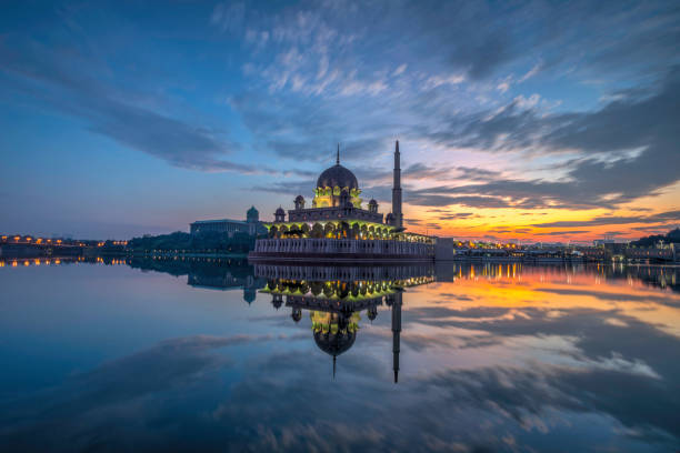 istock Blue hour before sunrise with perfect water reflection of a mosque 1226326653