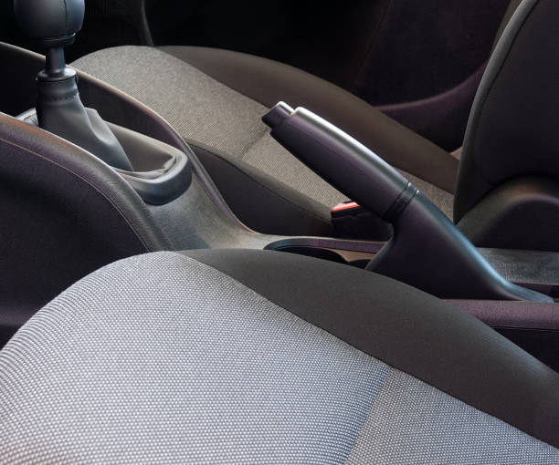 istock Modern car handbrake lever and transmission interior between front seats 1226327487