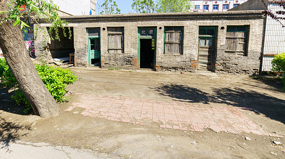 Dilapidated house in Hebei, China。Chinese character \